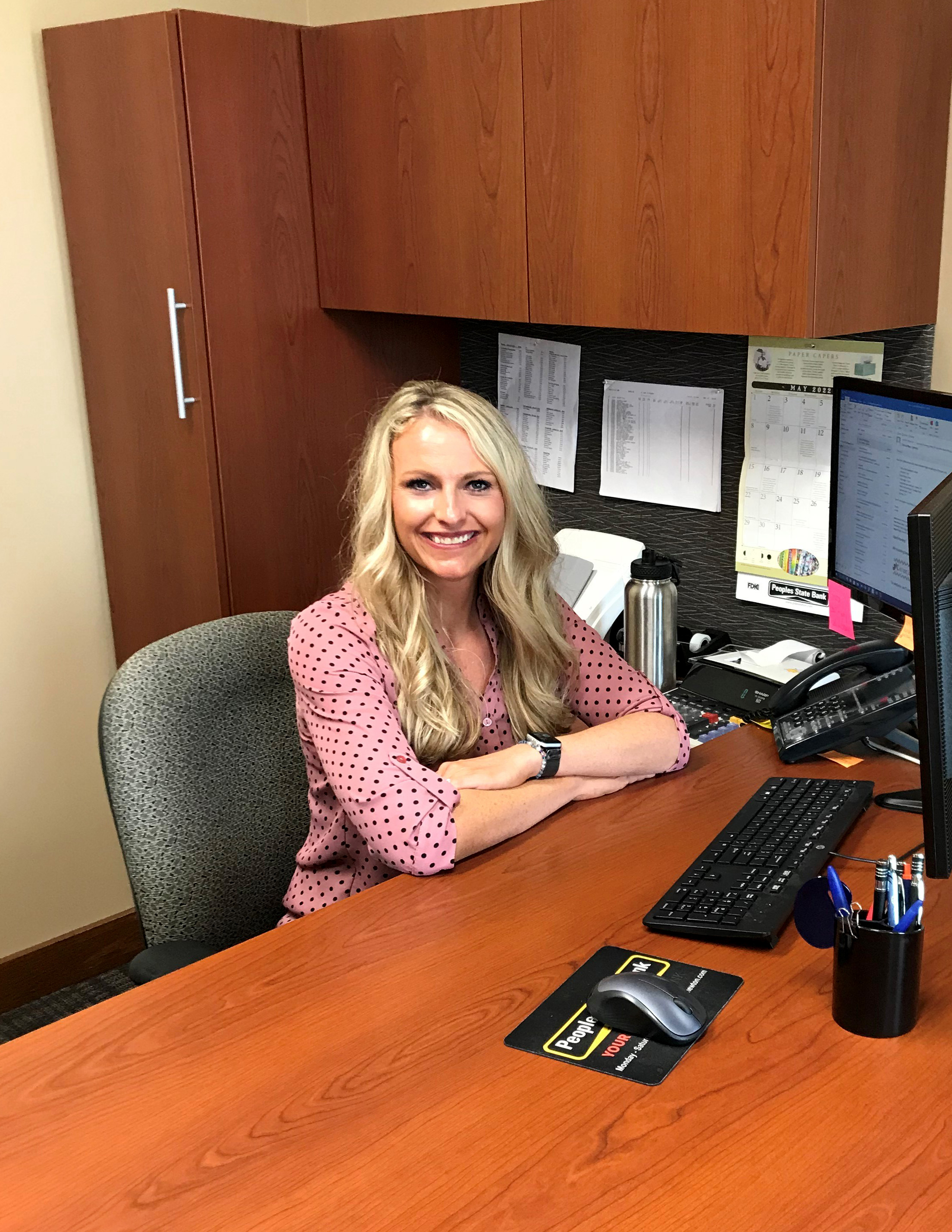 Peoples State Bank staff sitting at desk